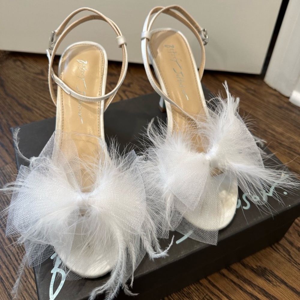 White ostrich feather heels